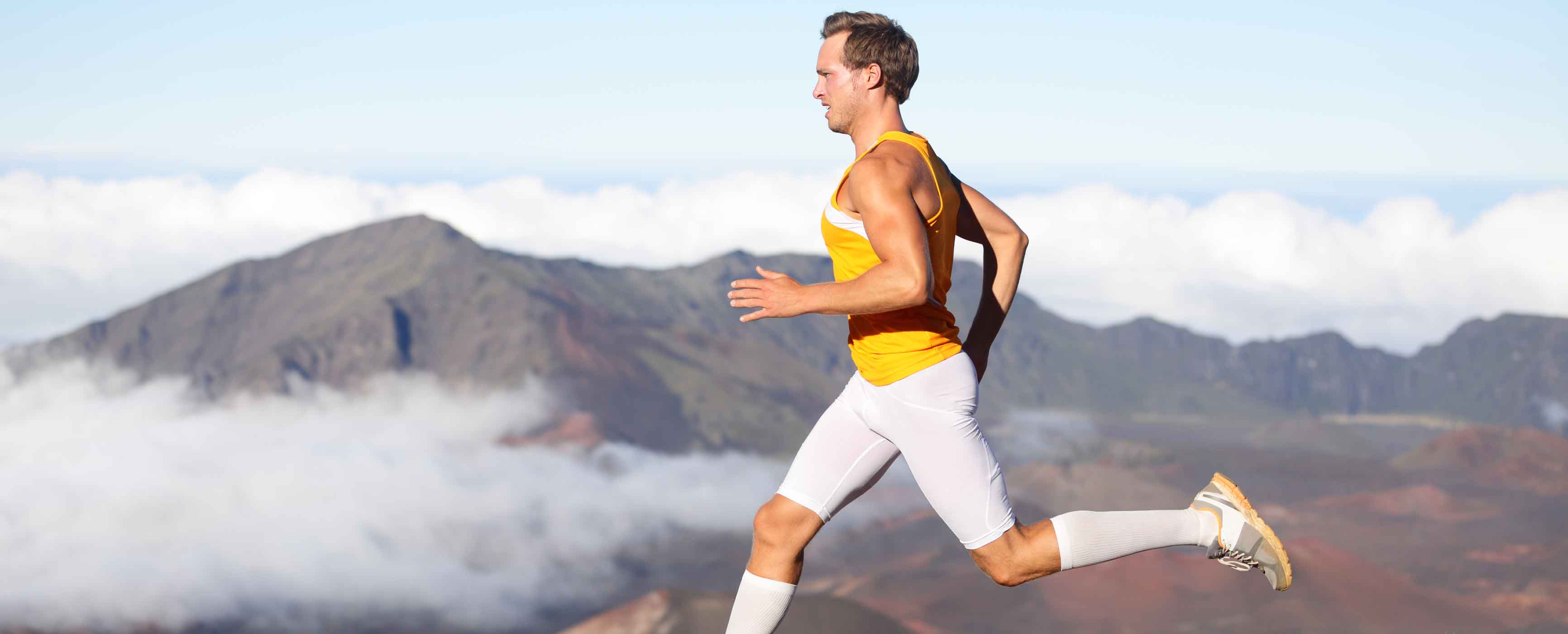 Runner man athlete running sprinting fast